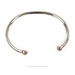 A chunky, sterling silver, torque bangle