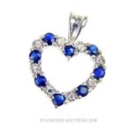 A 14 ct white gold, heart pendant, studded with sapphires and diamonds