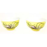 A pair of Chinese, egg-shell porcelain bowls with yellow grounds