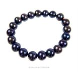 A black, cultured pearl bracelet