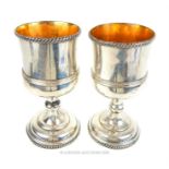 A pair of Georgian silver plated goblets