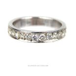 An elegant, 18 ct white gold and twelve-diamond eternity ring