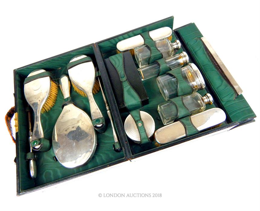 A cased complete silver vanity set, Mappin & Webb,