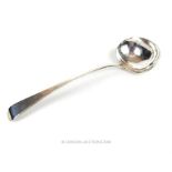 A large George III sterling silver soup ladle, Stephen Adams