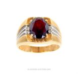 A 10 ct, gentleman's, yellow and white gold, garnet and diamond ring