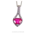 An 18 ct white gold, ruby and diamond pendant on a silver chain