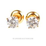 A pair of 18 ct yellow gold, diamond stud earrings