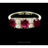 A fine, antique, 18 ct white gold, ruby and diamond ring