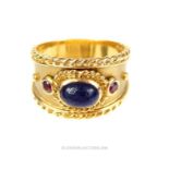 A 9 ct, yellow gold, Elizabeth Gage-style, amethyst and garnet ring