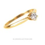 A 9 ct yellow gold diamond solitaire ring (0.20 carats)