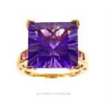 A 9 ct yellow gold, square, faceted, amethyst ring