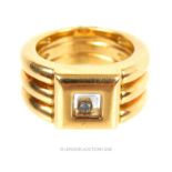 An 18 ct yellow gold, diamond and glass-panel ring