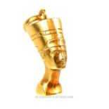 An 18 ct yellow gold, Egyptian Pharaoh bust pendant