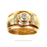 A 9 ct yellow gold, chunky, brilliant cut diamond ring