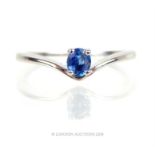 An 18 ct white gold and sapphire ring