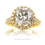 An 18 ct yellow gold, diamond, solitaire ring (4.2 total carats)