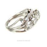 A stunning, platinum, Art Deco, four-stone, diamond ring