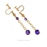 A pair of Edwardian, 9 ct yellow gold, seed pearl and amethyst drop earrings