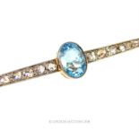 An 18 ct yellow gold and platinum, aquamarine and diamond, bar brooch