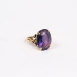 A large, 9 ct yellow gold, claw-set amethyst ring