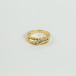 A 14 ct yellow gold and baguette-diamond ring