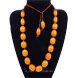 A amber, seventeen, large-bead necklace