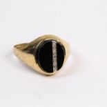 A 9 ct yellow gold, black onyx and diamond ring