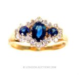 A 9 ct yellow gold, diamond and triple-sapphire cluster ring