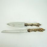 A matching sterling silver and stainless steel cake knife and cake slice