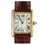 An 18 ct yellow gold, Cartier, 'Tank Louis' wristwatch with authentication papers