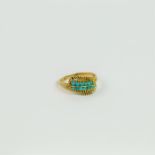 An 18 ct yellow gold and turquoise ring