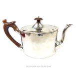 A George III sterling silver Neoclassical tea pot