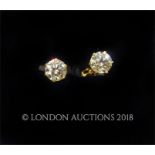 A boxed pair of 18 ct yellow gold, diamond, solitaire stud earrings (0.20 carats total)