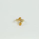 An 18 ct yellow gold and citrine ring
