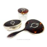 A set of three sterling silver and tortoiseshell dressing table items