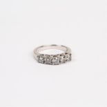 A 14 ct white gold and 5-stone, diamond ring, (0.75 carats total)