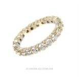 An 18 ct white gold and diamond eternity ring (1.2 carats approx)