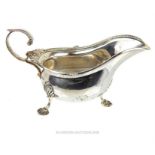 A sterling silver sauce boat