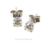 A pair of 18 ct white gold, diamond stud earrings