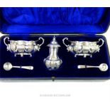 An Edwardian sterling silver cruet set