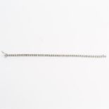 A, boxed, 9 ct white gold and diamond tennis bracelet