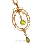 A 9 ct yellow gold, peridot and seed pearl pendant on 9 ct chain