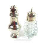 An Egyptian 900 standard solid silver sugar caster and another