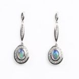 A pair of 18 ct white gold, black opal and diamond, drop earrings