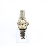 Rolex Oyster Perpetual Date Adjust two tone lady's watch.