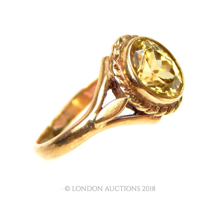 A 9 ct yellow gold and faceted, yellow sapphire ring - Image 2 of 3