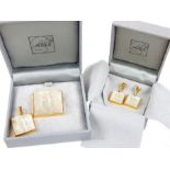 A boxed suite of Lalique, silver-gilt 'Masque du Femme' jewellery