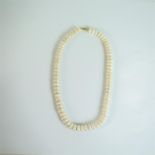 A boxed, 14 ct yellow gold and white, South Sea pearl necklace