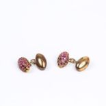 A pair of antique, 9 ct yellow gold, ruby-studded cuff-links