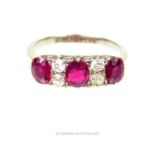 A antique, 18 ct white gold, ruby and diamond ring